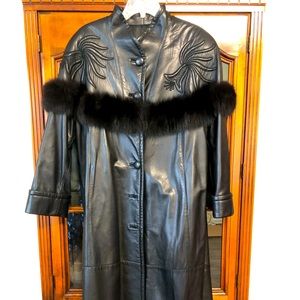 Women’s vintage leather fur trim coat